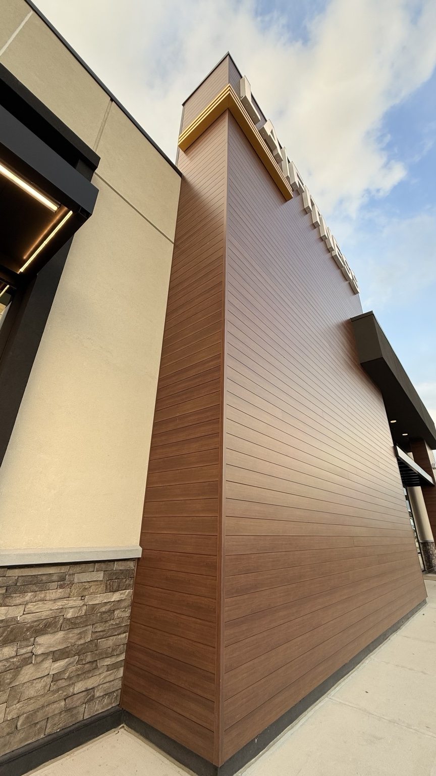 Close view of finished horizontal cladding at LA Fitness