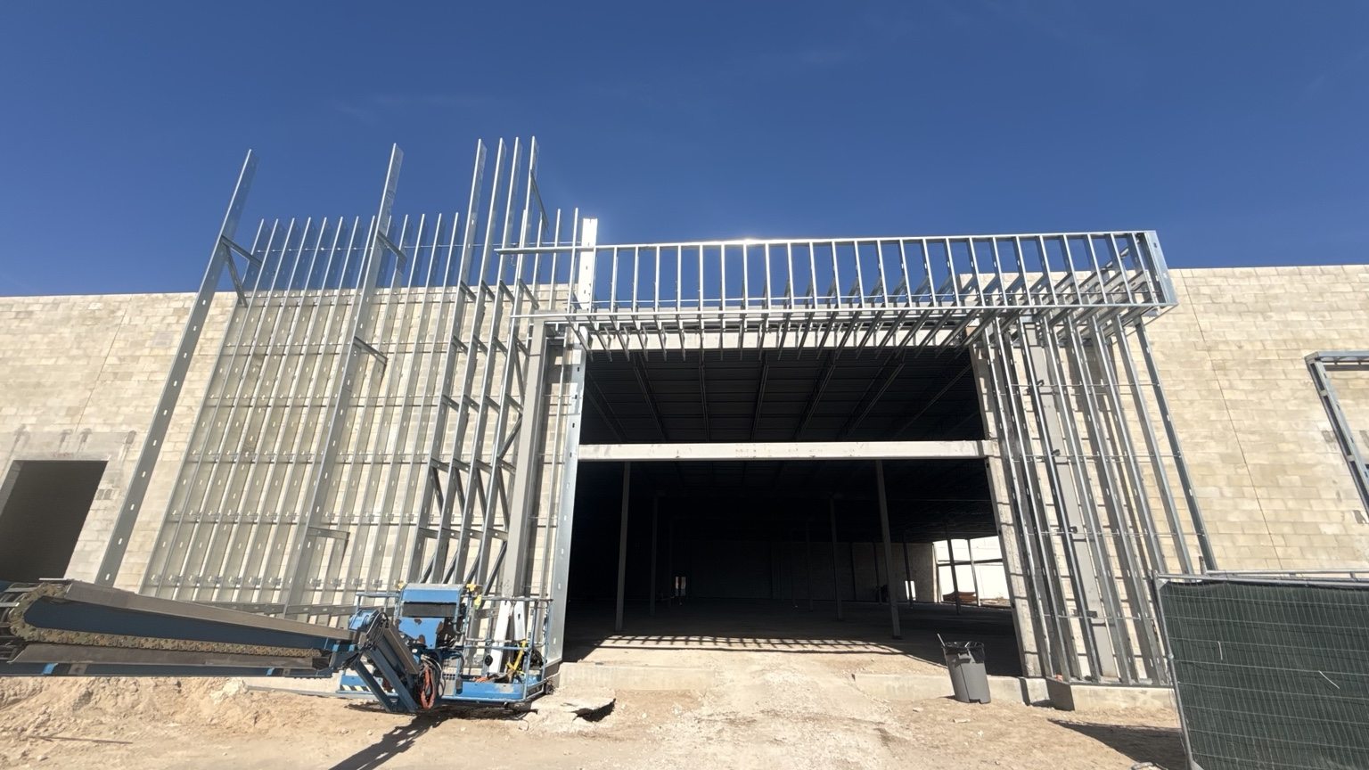 Metal framing around the LA Fitness main entry